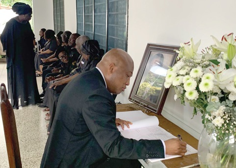 Samuel Okudzeto Ablakwa, Minister of Foreign Affairs, signing the book of condolence on behalf of the Ministry of Foreign Affairs