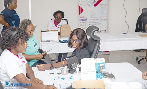 Staff of Prudential Bank undergoing health screening