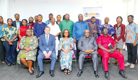 Harriet Nuamah Agyemang (seated left), Country Director, SEND Ghana, with Abena Osei-Asare (seated middle), Chairperson, Public Accounts Committee of Parliament; Samuel Atta Mills (seated 2nd from right), Ranking Member, Public Accounts Committee of Parliament; Hooman Nouruzi (seated 2nd from left), Head of the Political and Governance Team, British High Commission in Ghana, and some participants in the meeting. Picture: ELVIS NII NOI DOWUONA 