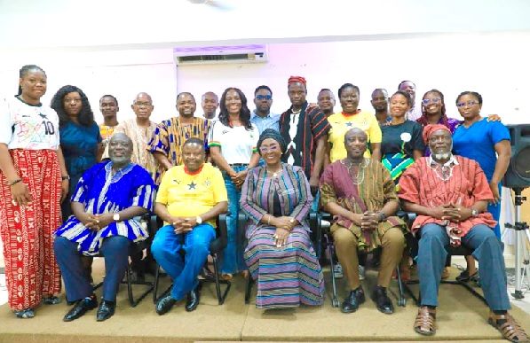 Abla Dzifa Gomashie (seated middle), Minister of Tourism with management and technical staff of the GMMB