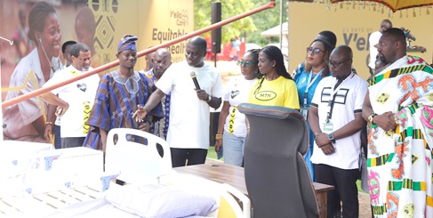 Charles Darko Prempeh (3rd from left), Managing Partner at Sika Pe Adjuma, briefing Adwoa Wiafe (4th from right), Chief Corporate Services and Sustainability Officer, MTN Ghana; Nana Kwamena Ansah I (right), Nsawamhene, and other dignitaries on some of the refurbished works during the ceremony. Picture: EDNA SALVO KOTEY