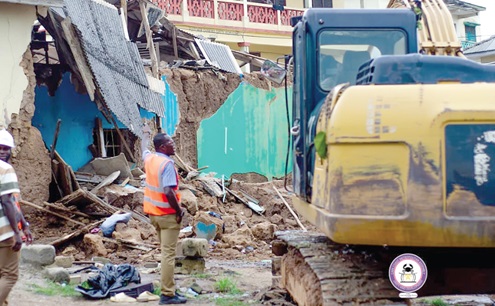 Some structures considered to contribute to the flooding being demolished