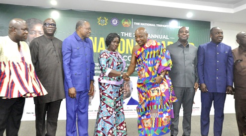Prof. Naana Jane Opoku-Agyemang, Vice-President and Togbe Afede, Agbogbomefia of Asogli, in a hearty handshake while other dignitaries look on