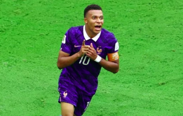 Kylian Mbappe celebrates scoring his second and France's third goal