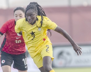 Benedicte Simon (right) of the Black Queens beats her Hong Kong marker to the ball in last Saturday’s clash