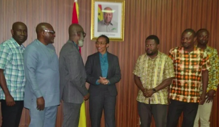 Dr Agyeman-Rawlings (middle) in a chat with Mr Samuel Dampare (third from left) after the event. With them is Dr Tandor (third from right) Photo Victor A. Buxton