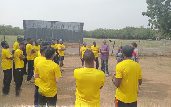LOC Chairman, Nii Okai Evans Andom (arrowed) and other members addressing the national team players after training