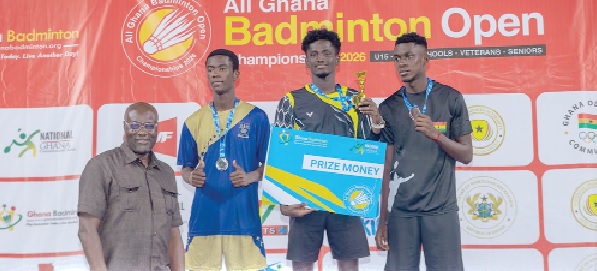 Ahmad Abdul-Samad, Men’s Singles champion, displaying his prize. He is flanked by runner-up Andy Amofa (left) and 3rd placed Brempong Ofori-Acheampong during the prize presentation