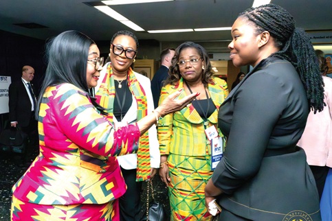  Lordina Dramani Mahama (left), First Lady, interacting with a participant