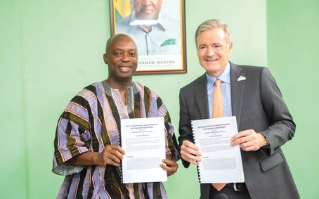 Dr Hugh C.A. Brown (left), CEO of the Forestry Commission, and Jad Daley, President of Terraformation, after signing the agreement