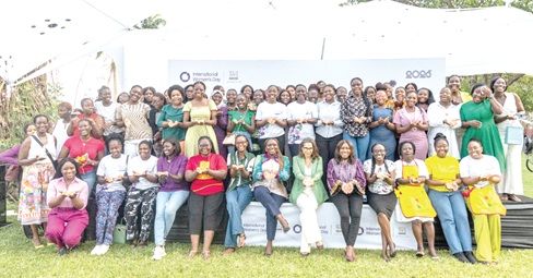 Salomé Azevedo (seated 6th from right), Managing Director of Nestlé Ghana, together with female staff of the company and other participants after the event