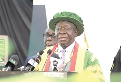 Otumfuo Osei Tutu II (right), the Asantehene, speaking at the 59th Special Congregation of KNUST in Kumasi 
