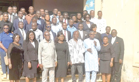 Members of the Parliamentary Select Commitee on Judiciary, together with the staff and management of the Sunyani High Court after the meeting