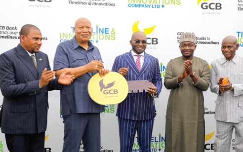 Prof Joshua Alabi (2nd from left), Board Chairman, GCB Bank PLC, handing over symbolically to Alhaji Osman Inusah (middle), CEO of Timeline and Innovations Company Limited, after the commissioning ceremony. Looking on is Alhassan Sayibu Suhuyini (2nd from right), Deputy Minister of Roads and Highways. Picture: ELVIS NII NOI DOWUONA 