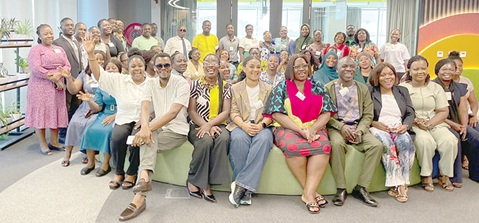 Rosalin Abigail Kyere-Nartey (left with hand up), Founder and Executive Director of the Africa Dyslexia Organisation, with the guests and participants