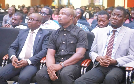 Elikem Kotoko (right), Deputy Chief Executive Officer, Forestry Commission; Prof. John Kwaku Mensah Mawutor (middle), Vice-Chancellor, UPSA, and some participants in the event