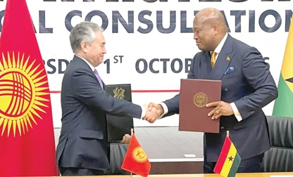 Samuel Okudzeto Ablakwa (right), Minister of Foreign Affairs, exchanging pleasantries with Zheenbek Kulubaev, Minister of Foreign Affairs of the Kyrgyz Republic, after signing the MoU