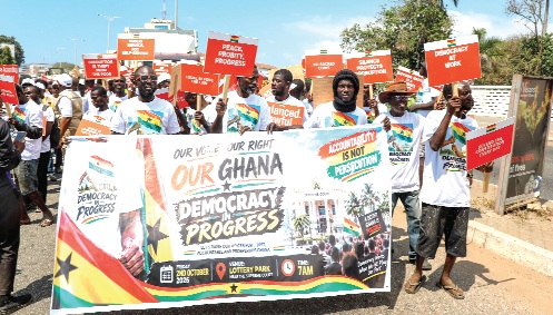 Demonstrators displaying their placards and banners during the  “Democracy in Progress” demonstration. Picture: ELVIS NII NOI DOWUONA 
