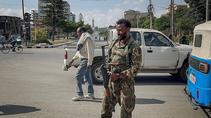 A pro-government soldier standing guard on a street in Ethiopia's Tigray region on Sunday