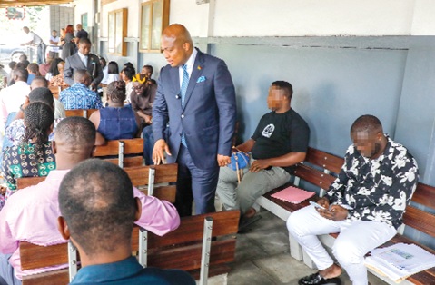 Samuel Okudzeto Ablakwa, Minister of Foreign Affairs, interacting with some visa applicants  at the application centre. Picture: ELVIS NII NOI DOWUONA 