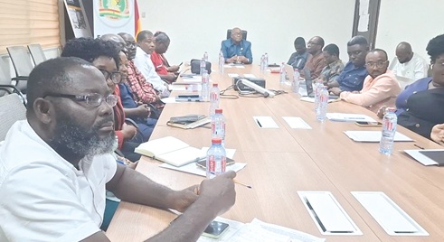 Dr George Smith-Graham (head of table), Chief Executive, Fair Wages and Salaries Commission, in discussion with pre-tertiary teacher unions over collective agreement 