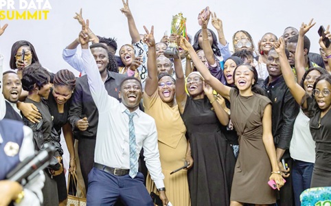 Akosua Kwafo Ogyiri (2nd from left), Communications and Advocacy Professional, Richard Sarkodie-Abebreseh (left), Founder and COO, Goodwill Insurance Brokers, and overall winners of the competition after the trophy was handed over
