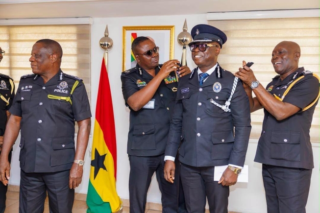 IGP Yohuno decorates 22 newly promoted Deputy Commissioners of Police including musician Kofi Sarpong