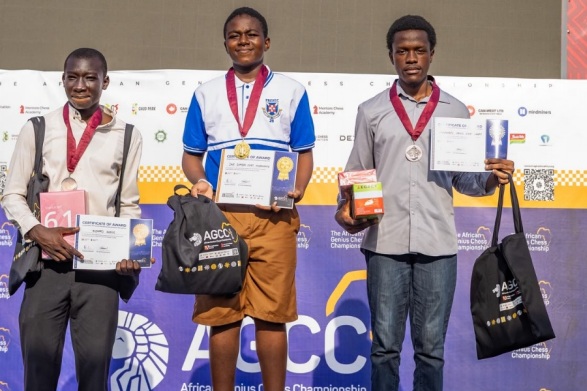 Under 20 winner, Master Dave Chief Q. Acheampong, on the podium with the second and third-place finishers.