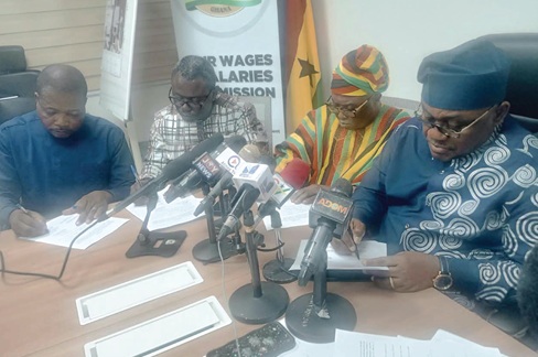 Dr George Smith-Graham (right), CEO, FWSC signing the agreement with Thomas Musah (2nd from right), General-Secretary, GNAT; King Awudu Ali (2nd from left), President, PRETAG; and Jacob Anaba (left), President, NAGRAT