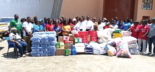 St Luke Anglican Church members and prison officers with the donated items at Nsawam Prison