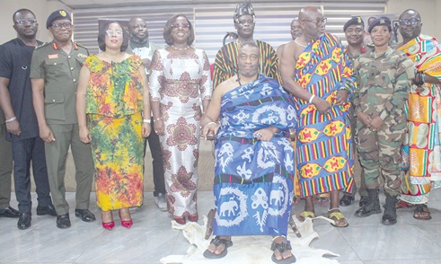 Nii Tackie Teiko Tsuru II (seated), Ga Mantse; Linda Ocloo (3rd from left), Greater Accra Regional Minister; Adjoa Obuobia Darko-Opoku (4th from left), Administrator, Ghana Medical Trust Fund; some security officials and other dignitaries. Picture: ERNEST KODZI