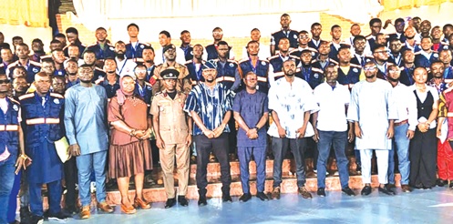 Officials of the Energy Commission, the Ghana Standards Authority and the Ghana National Fire Service with some of the newly certified electrical wiring professionals
