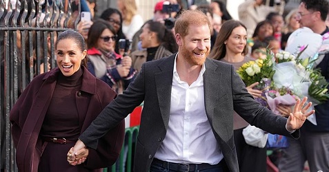 Formally known as the Duke and Duchess of Sussex, they posed for selfies, hugged members of the crowd and accepted flowers
