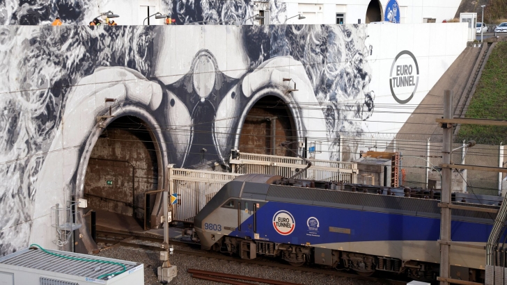 Bus collides with train stopped on French side of Channel Tunnel that connects Europe to United Kingdom leaving at least 19 hurt
