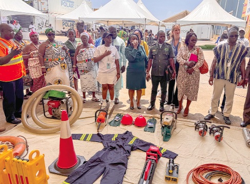 Fred Atsriku (left), Deputy Chief Disaster Control Officer of  Urban Search And Rescue, NADMO, showcasing some equipment for their operations. Picture: ELVIS NII NOI DOWUONA 