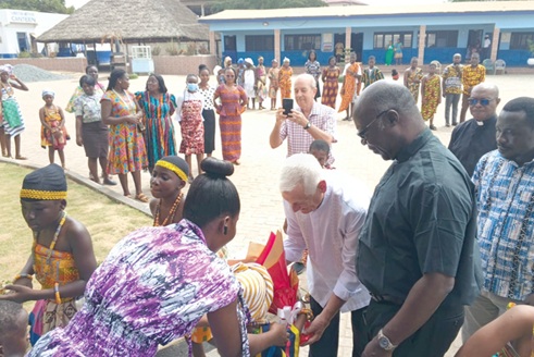 Very Rev. Fr Arturo Sosa, Superior General of the Society of Jesus, being welcomed by a learner to the school