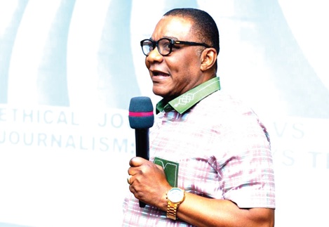 Kobby Asmah, a member of the National Media Commission, speaking at the event