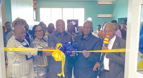 Inset: Eric Seddy Kutortse (middle), Executive Chairman of the First Sky Group,  Dr Yakubu Seidu Adam (2nd from right), CEO of the Korle Bu Teaching Hospital;  Mercy N.K. Boampong (2nd from left), CEO of Serene Insurance, and Charles E. Gidi (3rd from right), Board Chair of Serene Insurance, cutting the ribbon to hand over the renovated ward