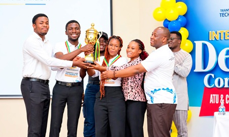 Professor Felix Y.H. Kutsanedzie (right), Pro-Vice-Chancellor, ATU, presenting an award to the winners after the competition