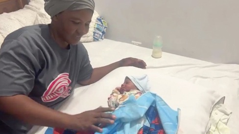Rafida Ramadan,  midwife with the Sombo health centre, with the abandoned baby