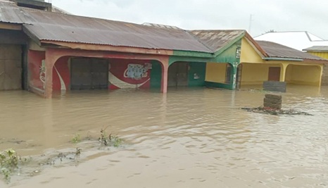 Submerged shops in floodwaters