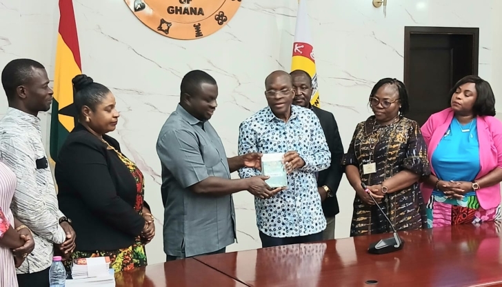 Mr Bagbin (3rd right), Speaker of Parliament, presenting the Code of Conduct for Members of Parliament to Dr Dwumfour, GJA President