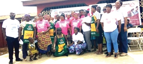 Beneficiaries and officials at the programme