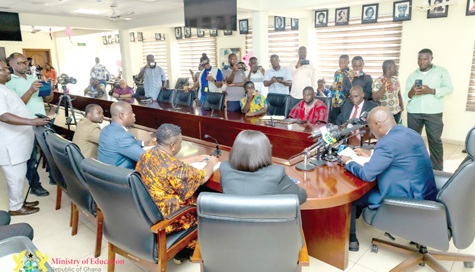 Haruna Iddrisu (right), Minister of Education, addressing the press