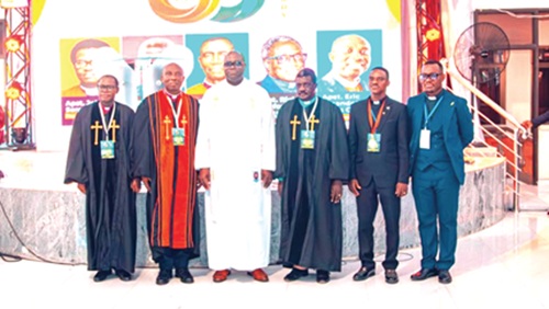 Rev Dr Abraham Nana Opare Kwakye (3rd from left), Moderator of the Presbyterian  Church of Ghana, flanked by Apostle Eric Essandoh Anim  Otoo (2nd from left), General Overseer of TLPCI, and other leaders after the conference