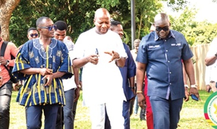 Michael Owusu (right), the Group Head of Corporate Affairs and Investor Relations for Regimanuel Groups Limited, conducting Mahama Ayariga (left), Minister of Local Government, Chieftaincy and Religious Affairs, round the RGL gated community