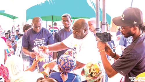 William Oppong Peasah (arrowed), the Executive Director of CODOP Outreach Ministry, interacting with the participants in the event 