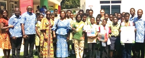The contestants with the officials of the school