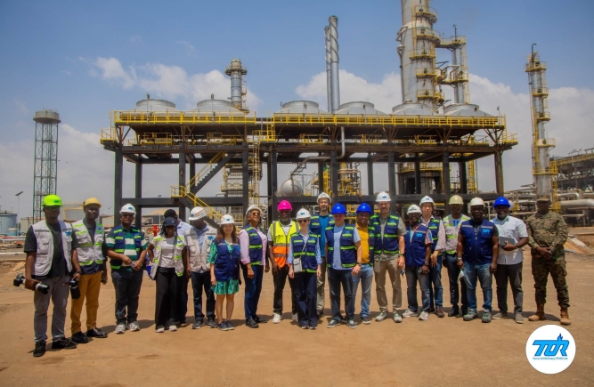 Edmond Kombat (4th from right), Managing Director,  TOR, with some staff and members of the IMF team