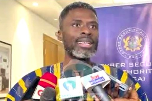 Martin Agyei Aboagye,  Manager, Child Protection, Cyber Security Authority, explaining a point to some journalists at the event
